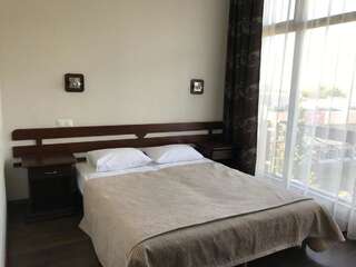 Гостиница Флора Адлер Стандартный двухместный номер с 1 кроватью или 2 отдельными кроватями-1